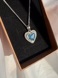 S925 heart pendant, with ashes set in a blue stone.