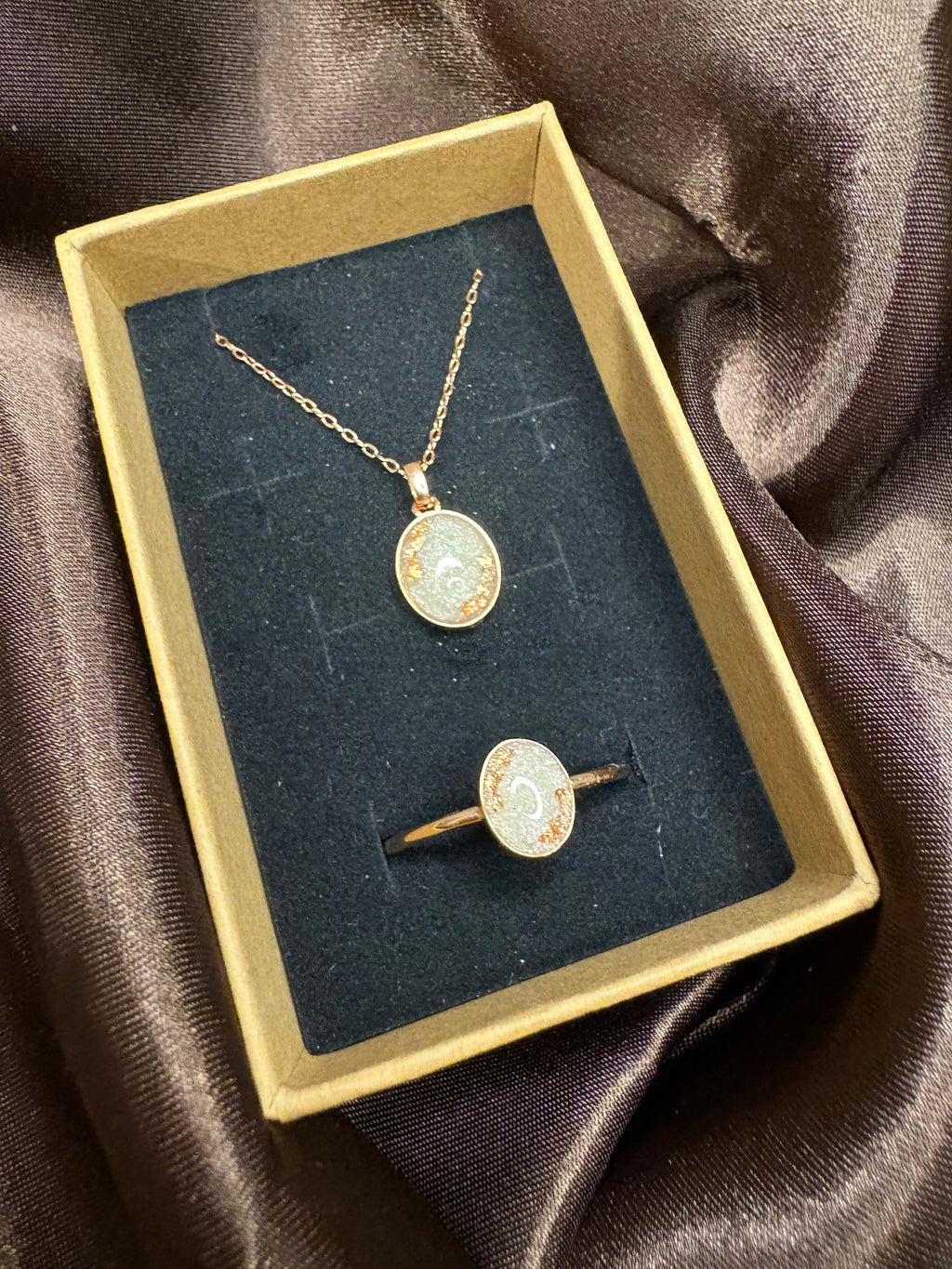 S925 gold plated ring and necklace, with hidden hair and tooth.