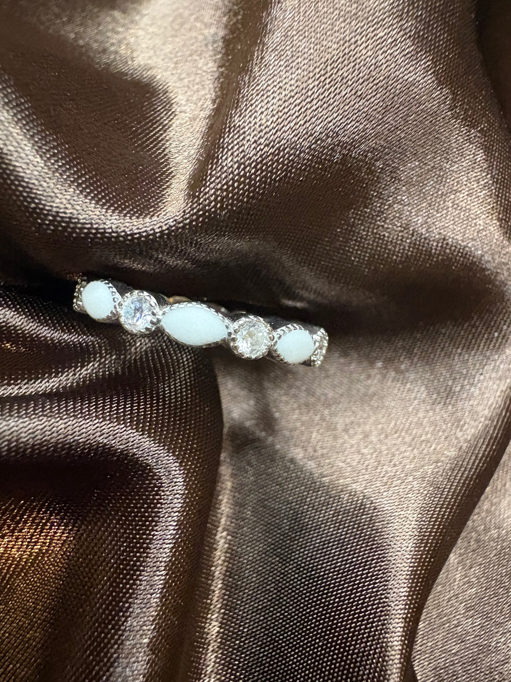 S925 breastmilk ring, with April / clear birthstones.