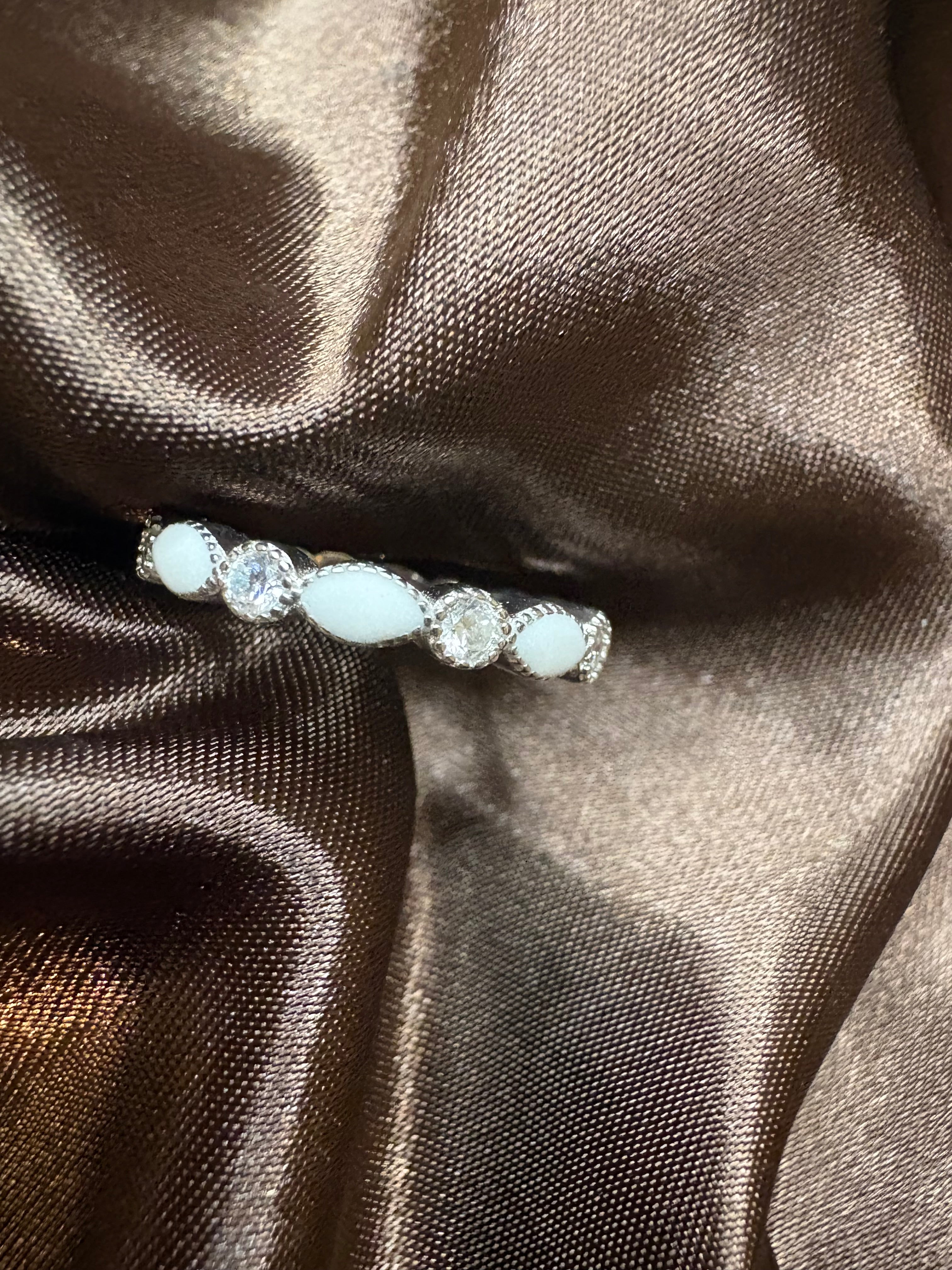 S925 breastmilk ring, with April / clear birthstones.