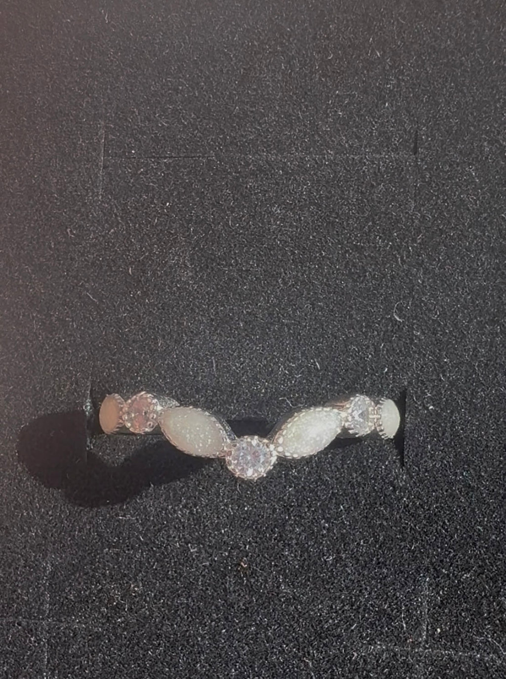 S925 breastmilk wishbone ring, with april/clear cz stones.